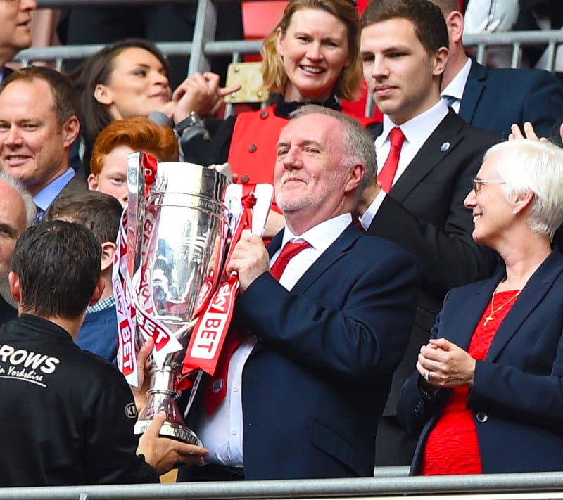 Patrick lifts the League One Playoff Trophy at Wembley