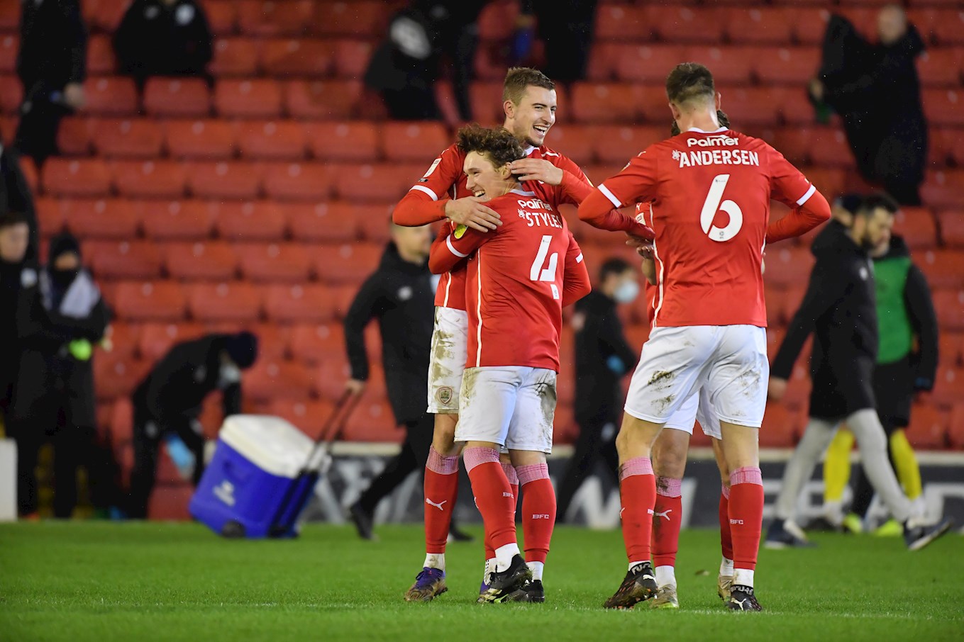 The Red celebrate at full-time against Huddersfield Town