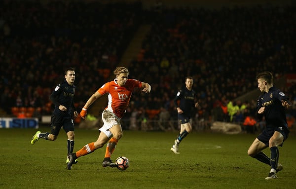Brad Potts in action for Blackpool against the Reds in 2017